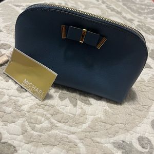 Blue Michael Kors cosmetic bag